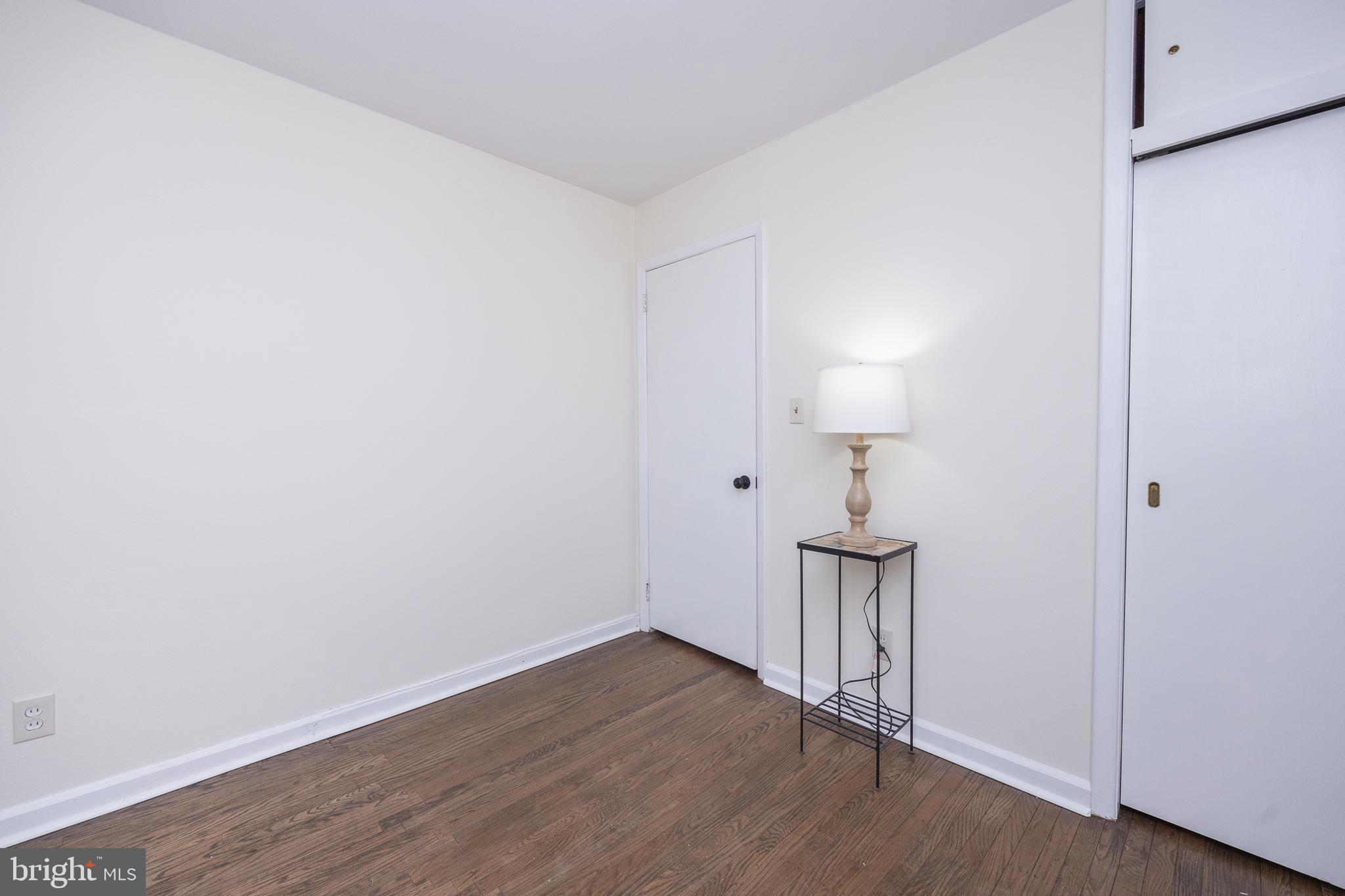 44 Matthew Drive Hamilton, NJ 08690 - Photo 16 of 27 a view of empty room with wooden floor