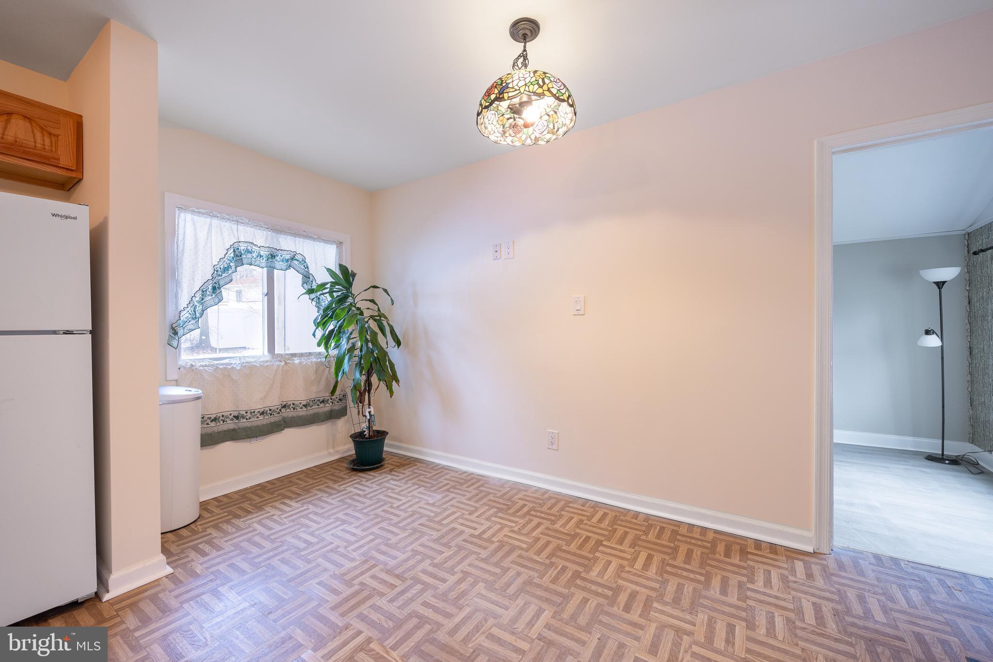 44 Matthew Drive Hamilton, NJ 08690 - Photo 6 of 27 a view of an empty room and a window