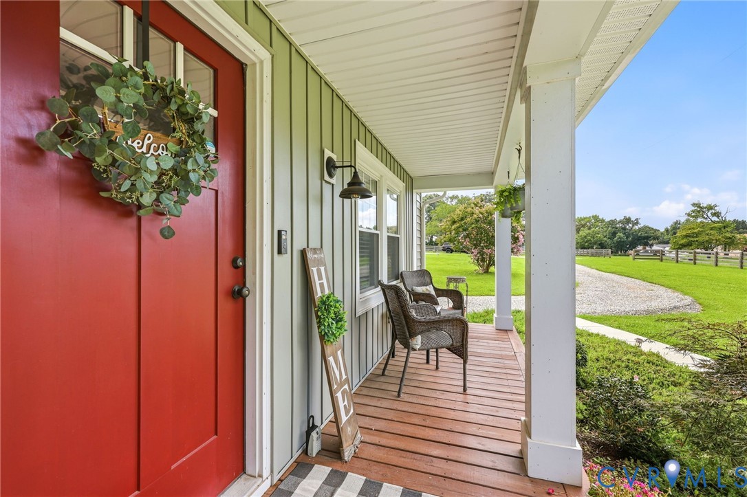 1108 Schroeder Road Powhatan, VA 23139 - Photo 3 of 33 Expansive covered porch featuring a rich wood-fini