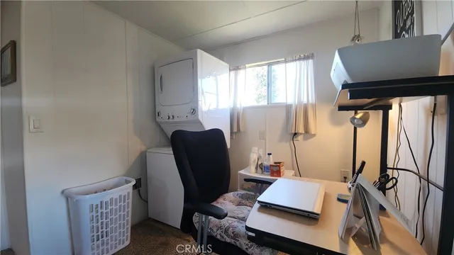 a room with furniture and a window