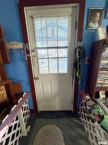 a view of an entryway with sitting area