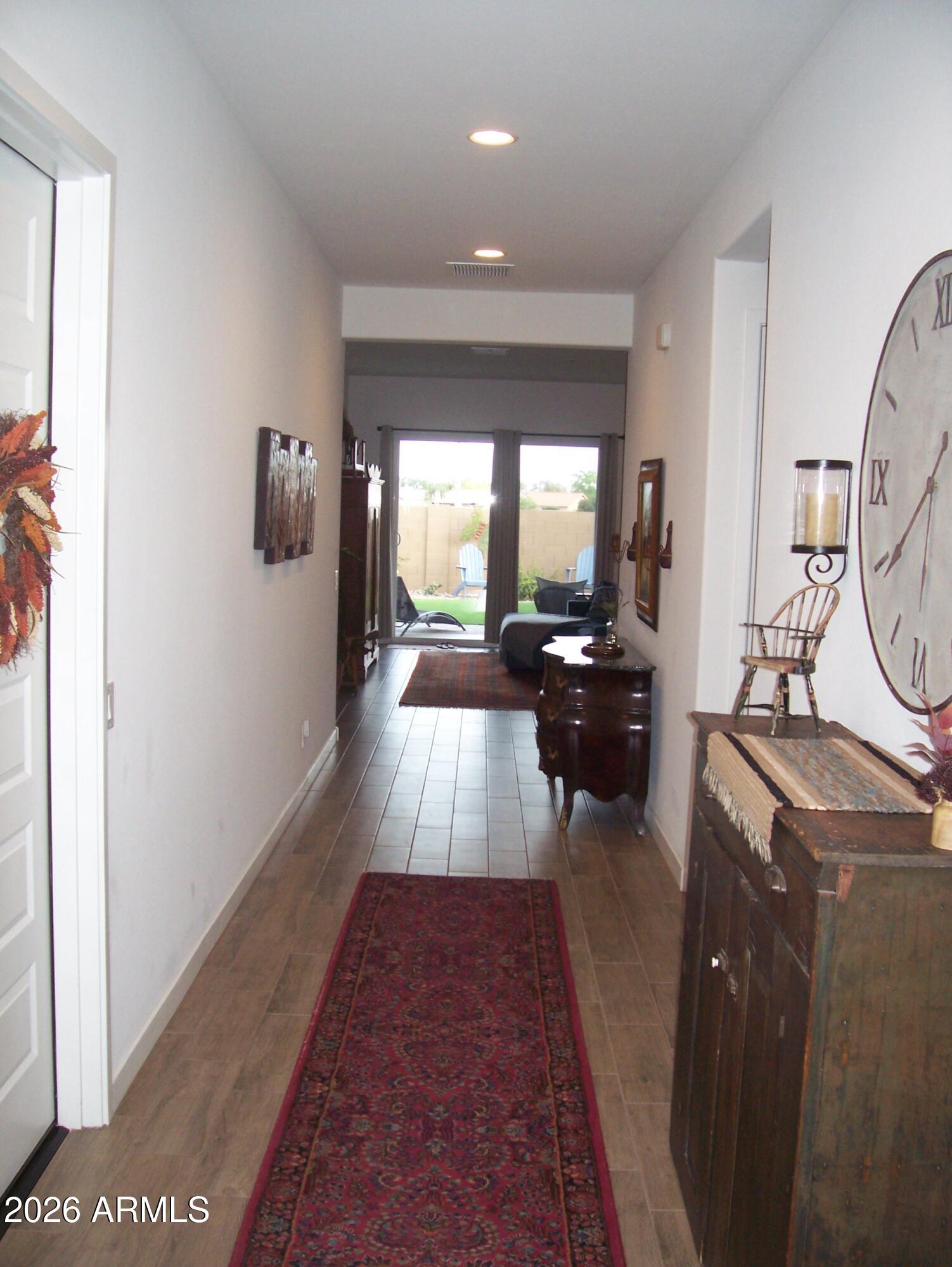 3255 West Peak View Road Phoenix, AZ 85083 - Photo 18 of 46 a view of a living room and dining room