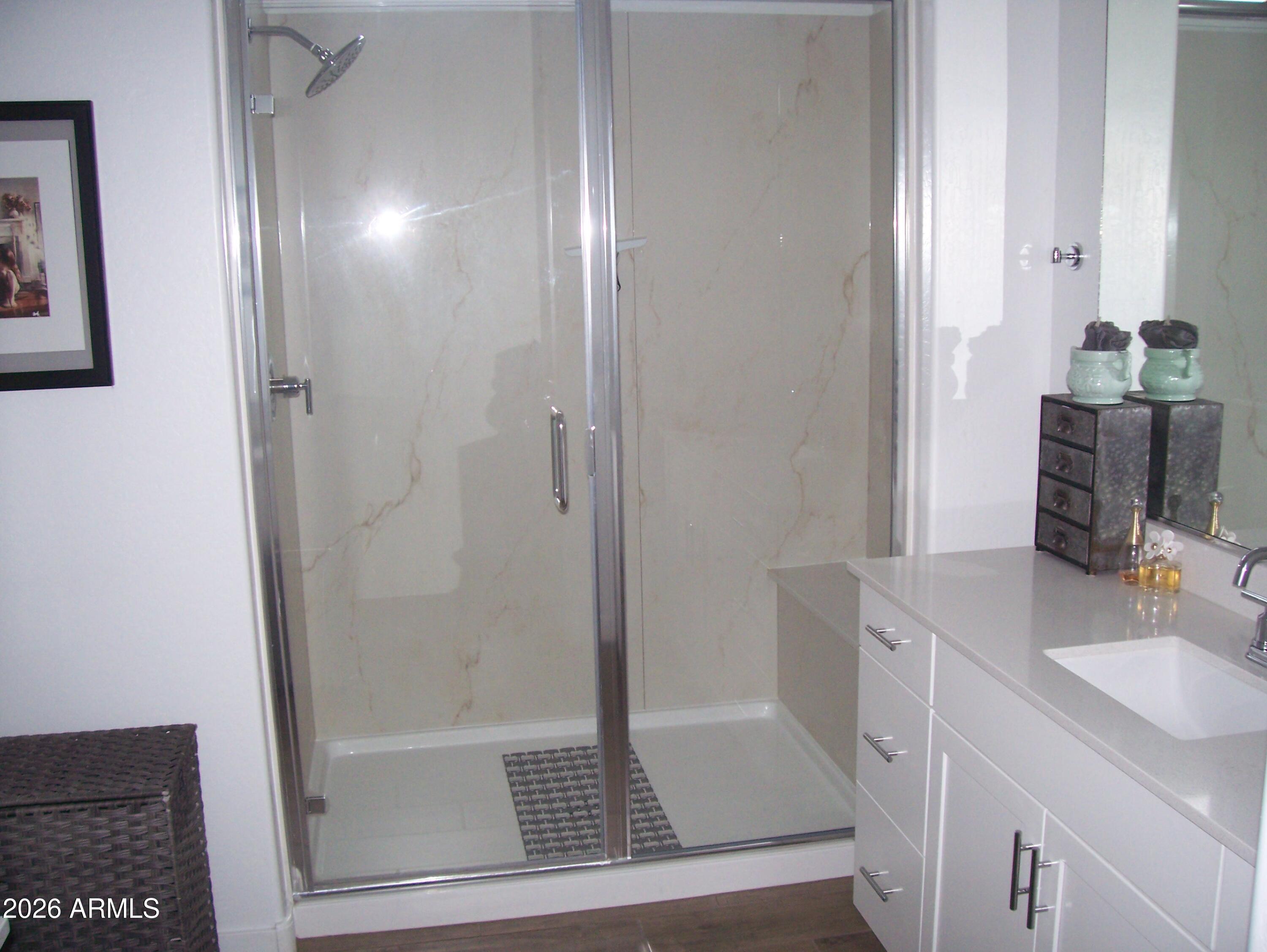 3255 West Peak View Road Phoenix, AZ 85083 - Photo 24 of 46 a bathroom with a shower and a sink