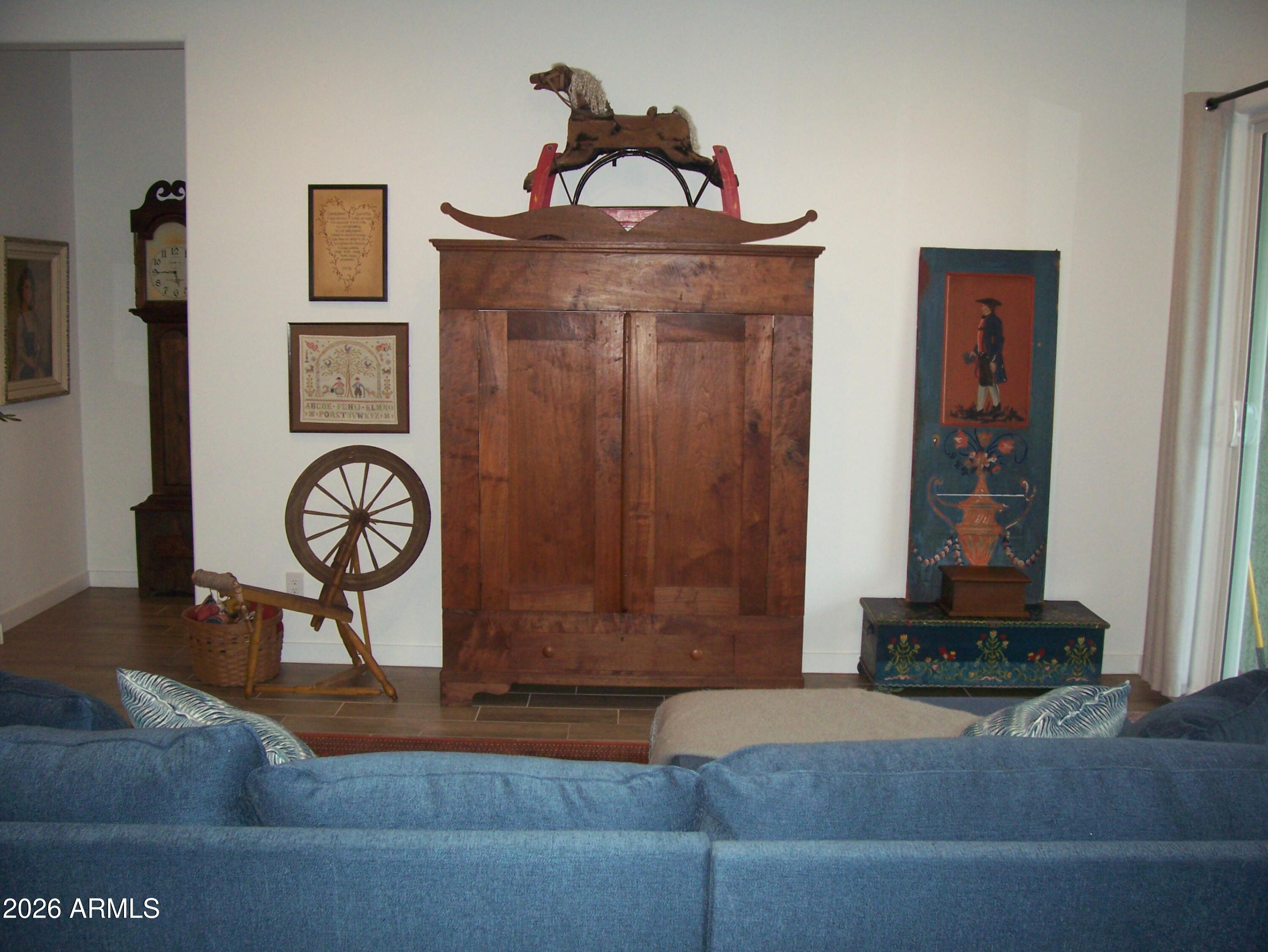 3255 West Peak View Road Phoenix, AZ 85083 - Photo 36 of 46 a living room with furniture and a window