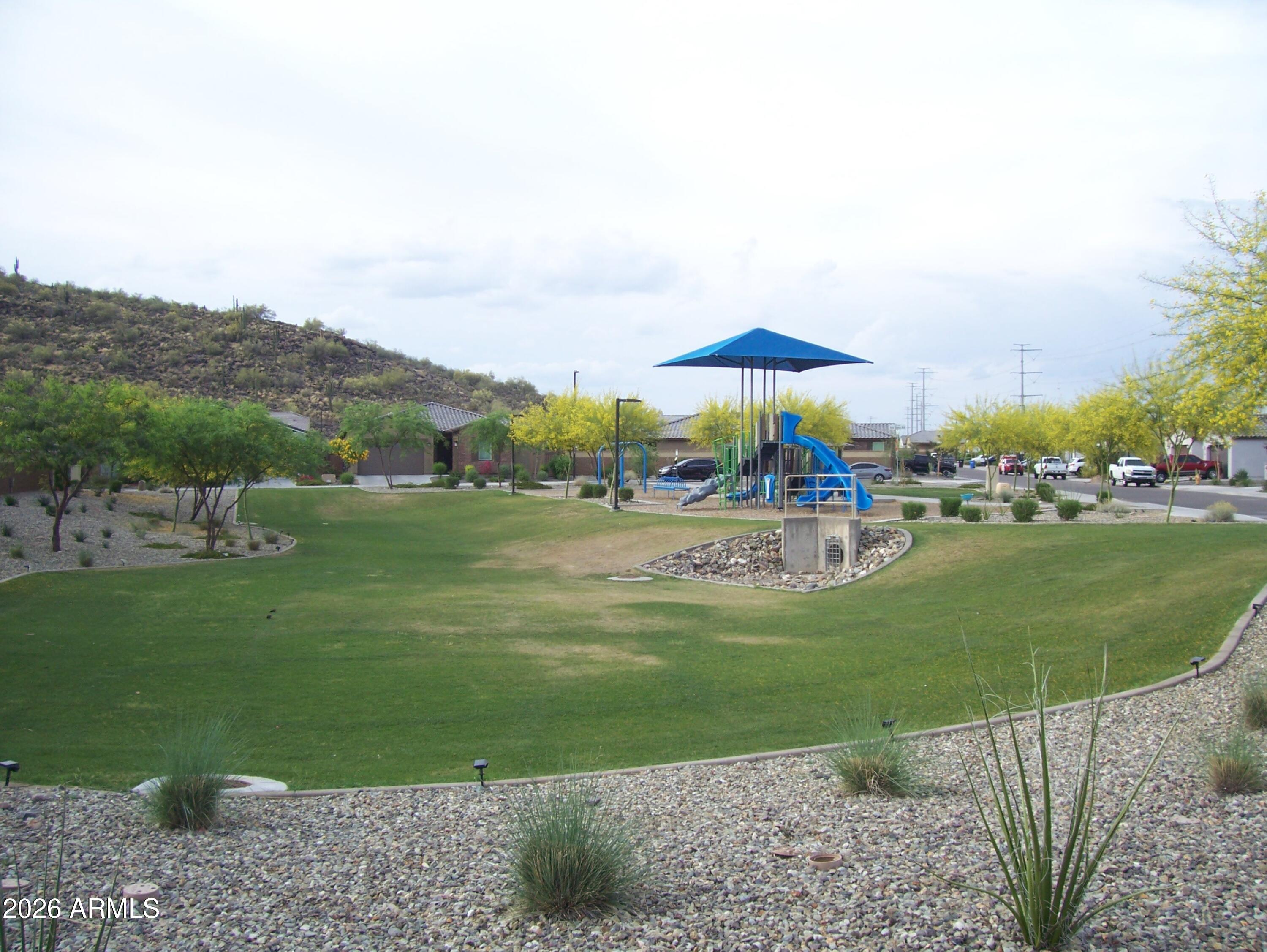 3255 West Peak View Road Phoenix, AZ 85083 - Photo 37 of 46 a view of a garden and mountains