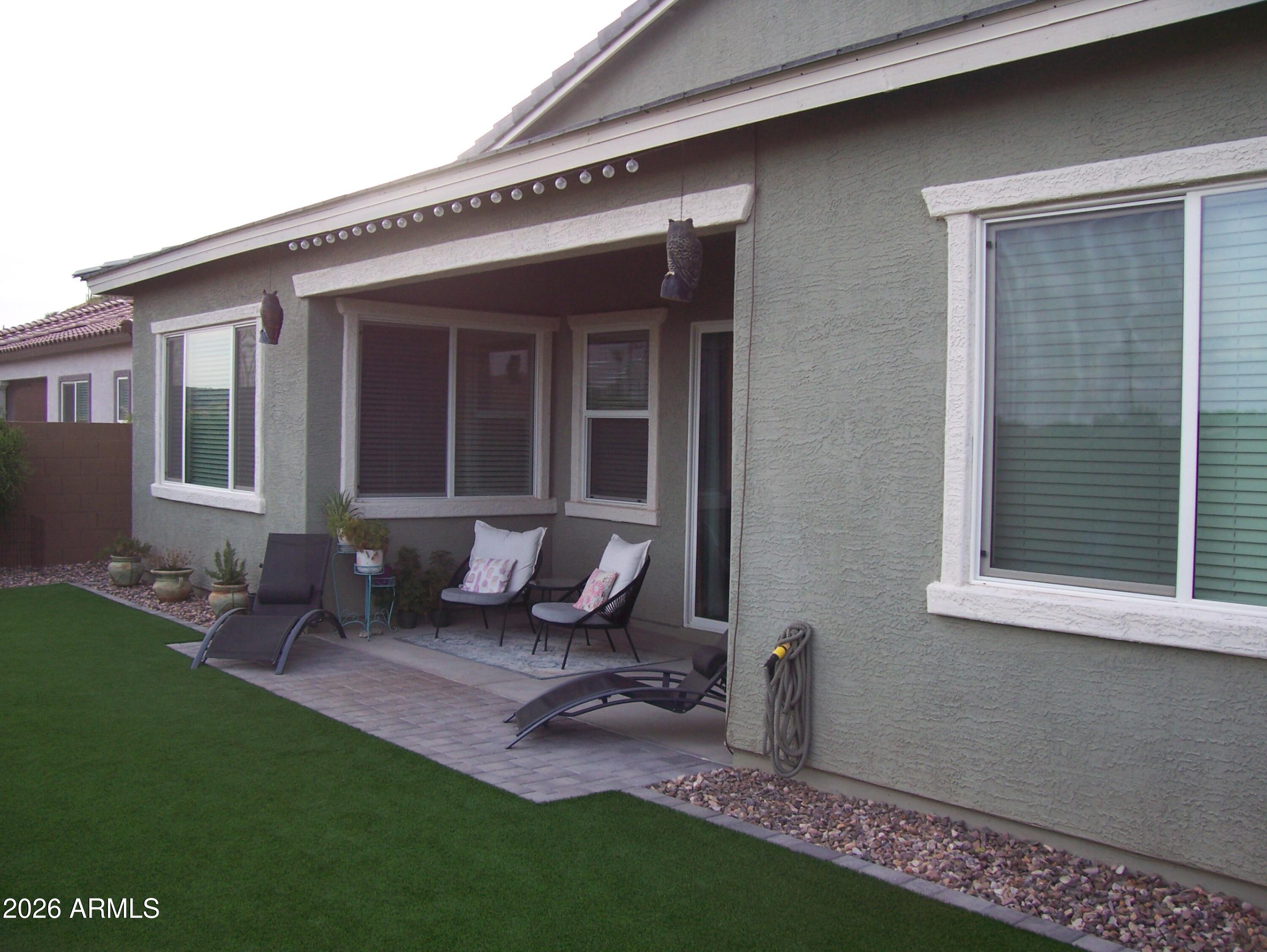 3255 West Peak View Road Phoenix, AZ 85083 - Photo 4 of 46 a front view of a house with garden