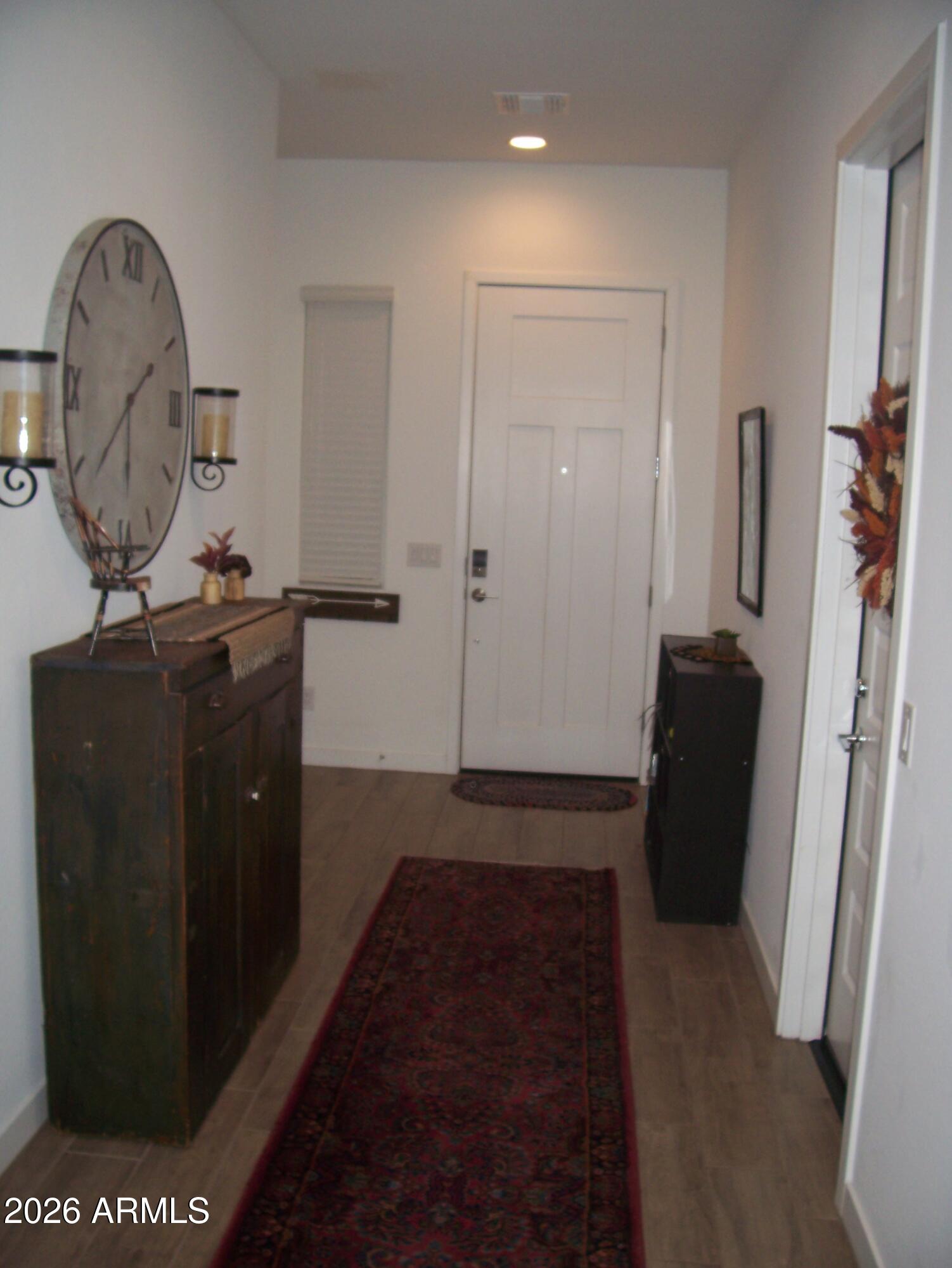 3255 West Peak View Road Phoenix, AZ 85083 - Photo 5 of 46 a view of hallway with mirror