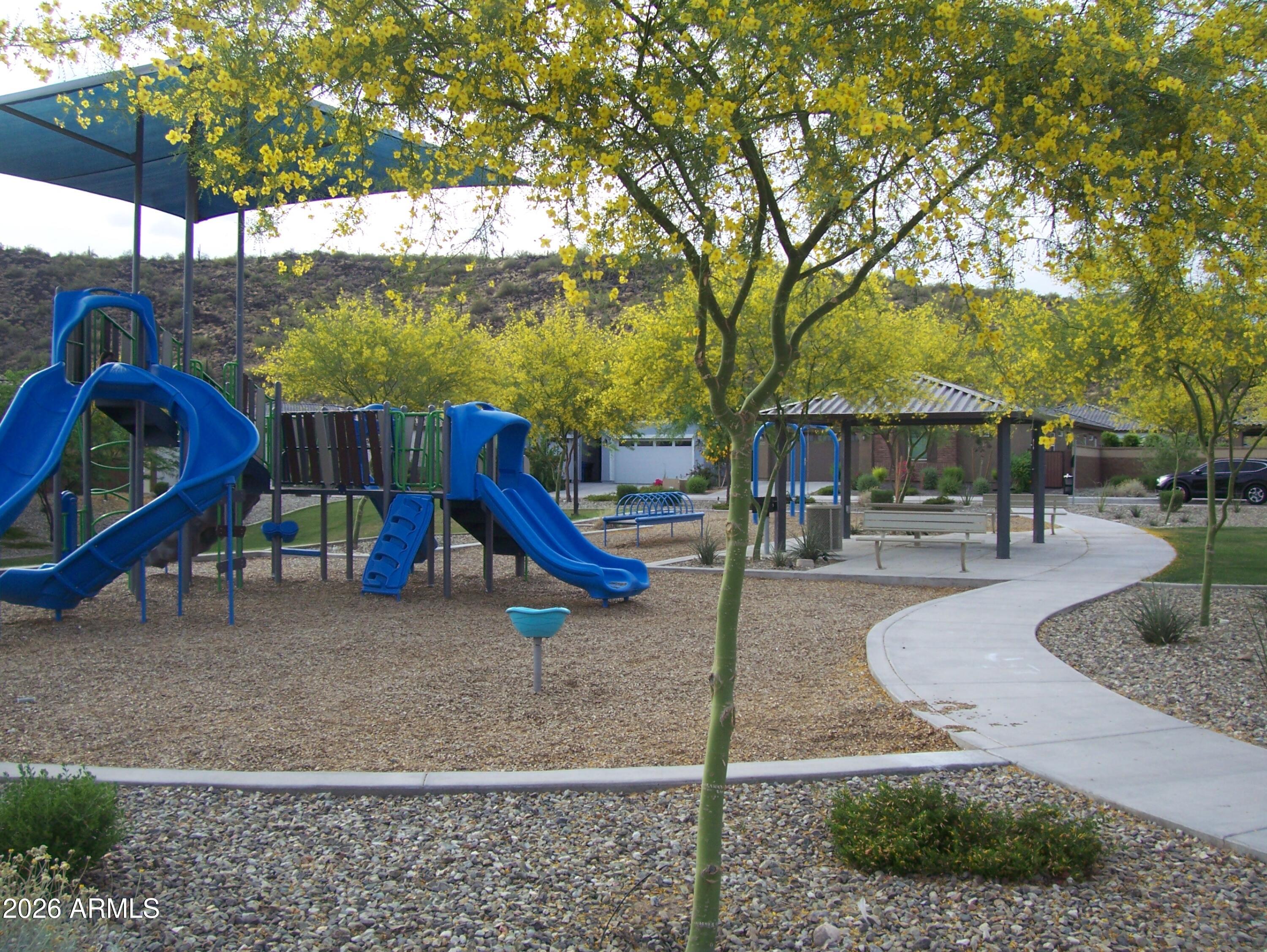 3255 West Peak View Road Phoenix, AZ 85083 - Photo 7 of 46 a view of a park with swings