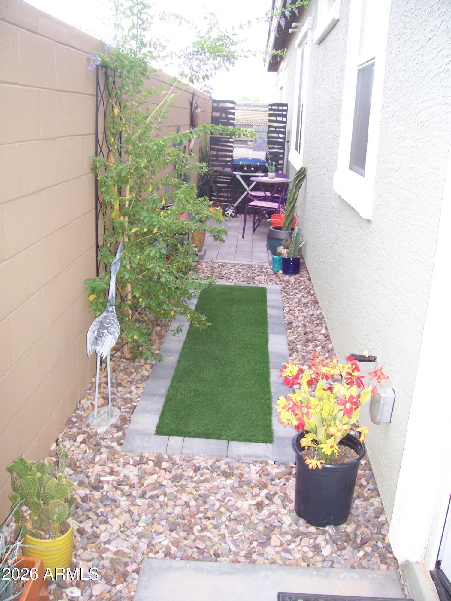 3255 West Peak View Road Phoenix, AZ 85083 - Photo 8 of 46 a view of a backyard with sitting area