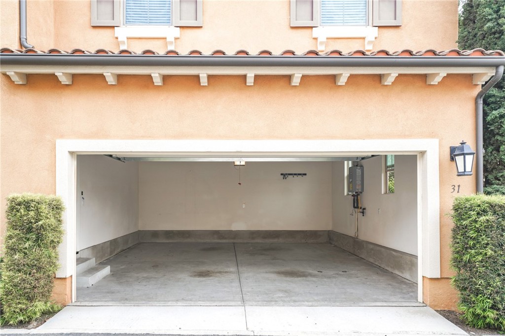 31 Bell Chime Irvine, CA 92618 - Photo 26 of 28 front view of a house with a balcony