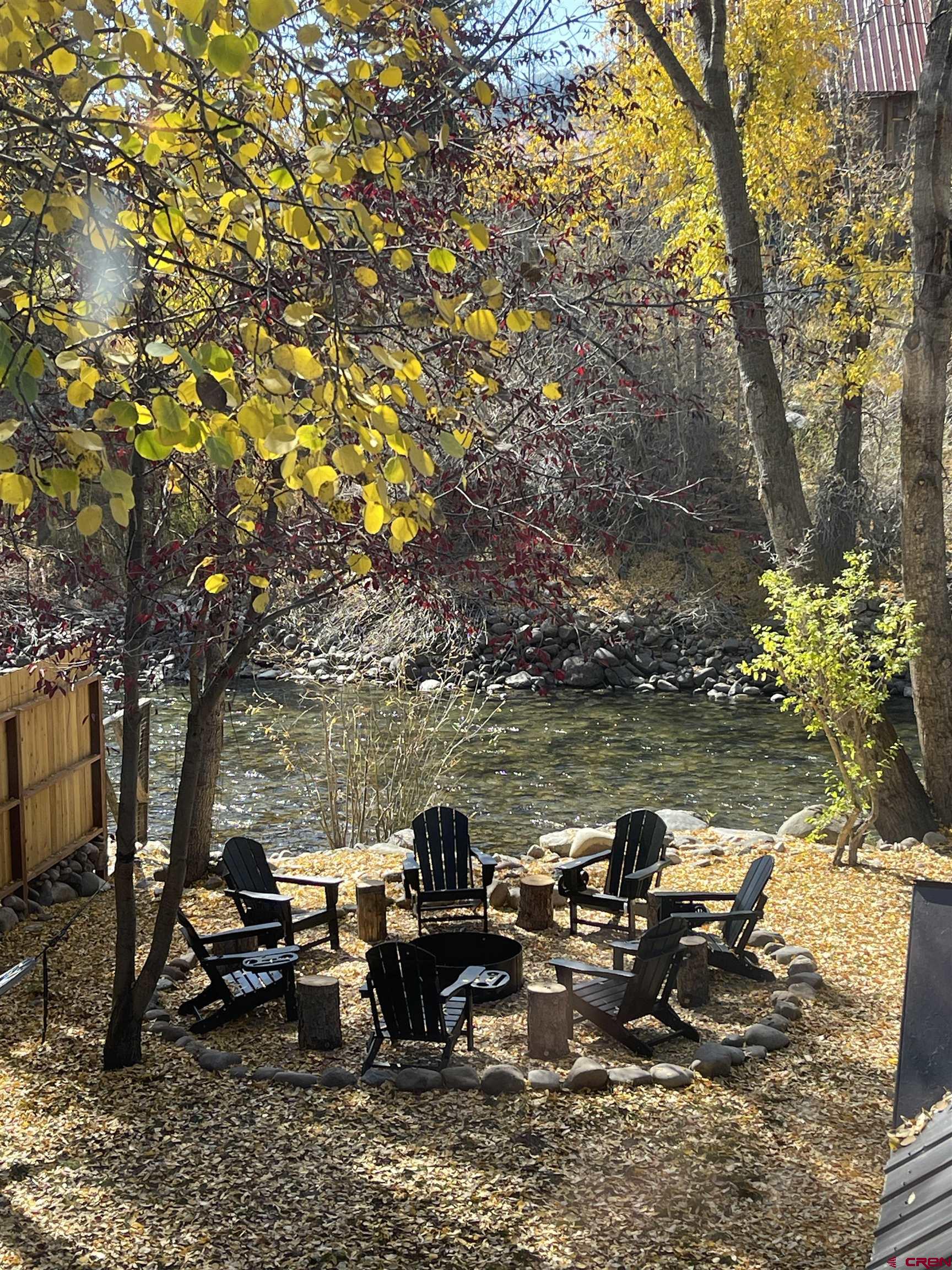 170 Lower Allen Road Crested Butte, CO 81224 - Photo 3 of 42 a view of a lake with outdoor seating
