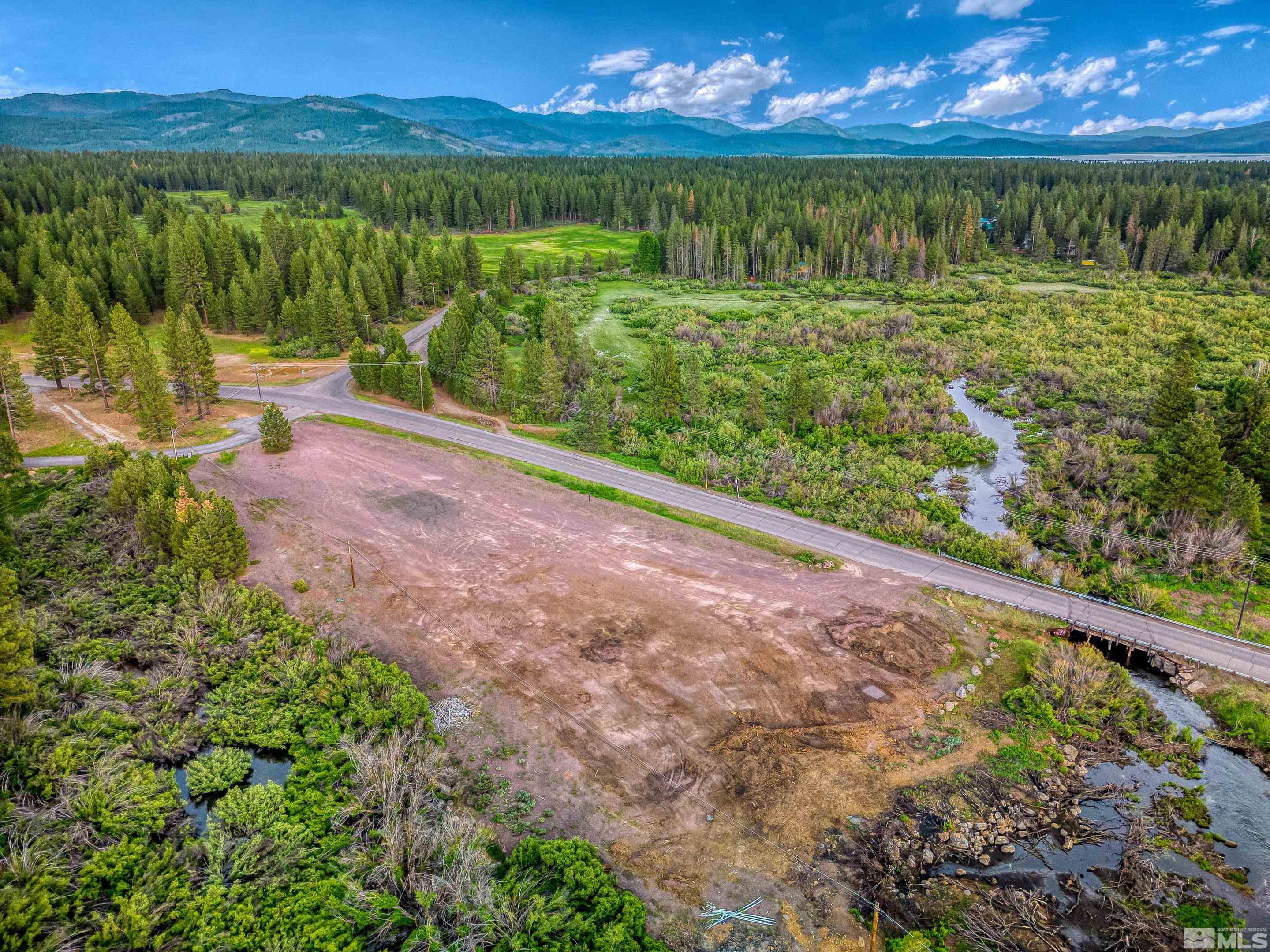 671-295 Mooney Road, Unit A21 Westwood, CA 96130 - Photo 15 of 20 a view of a lake from a yard
