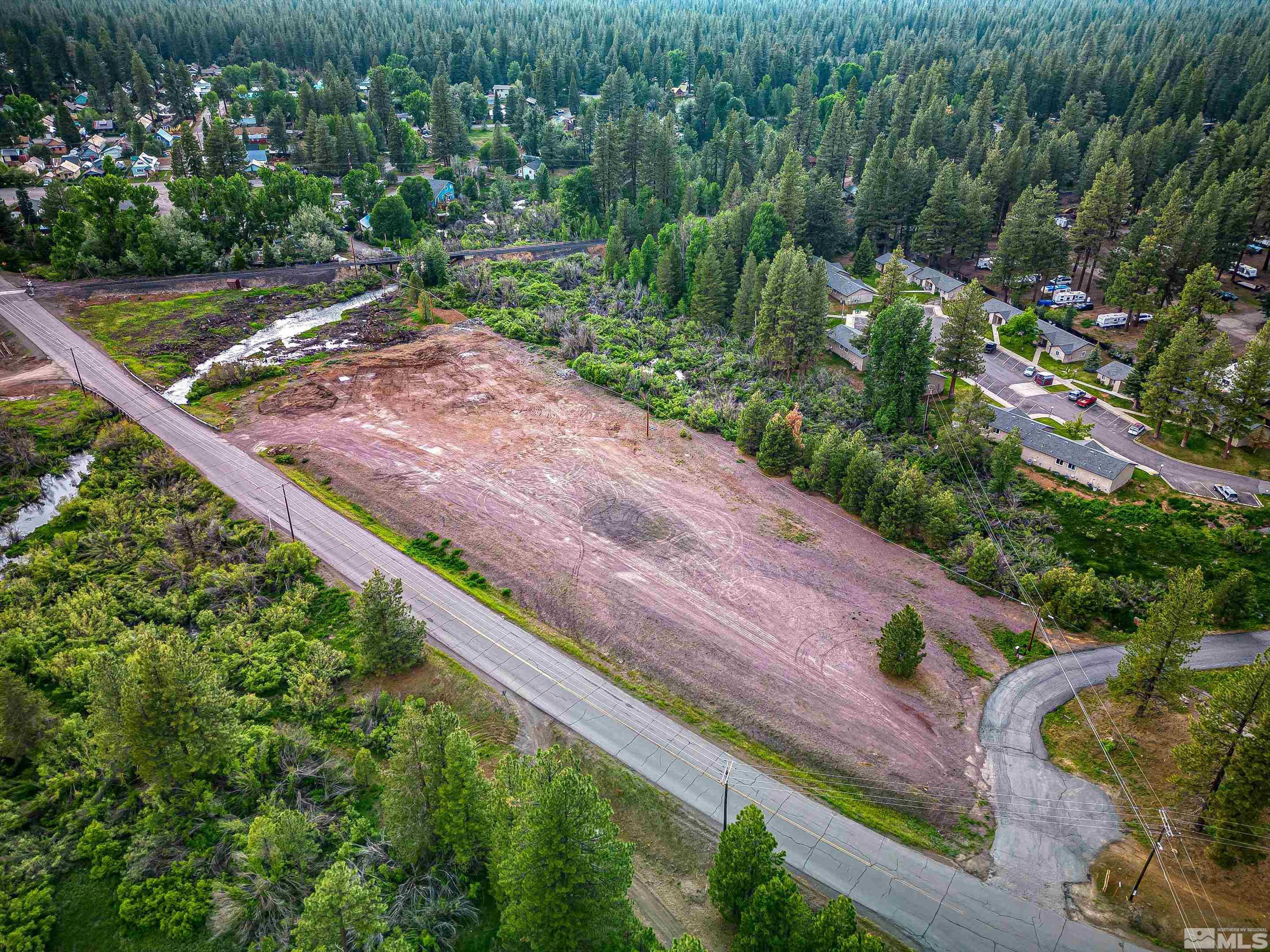 671-295 Mooney Road, Unit A21 Westwood, CA 96130 - Photo 3 of 20 a view of a yard with a street