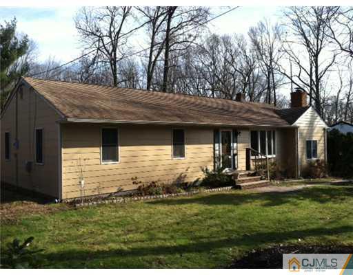 242 New Road Monmouth Junction, NJ 08852 - Photo 2 of 11 a view of a house with backyard