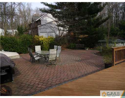 242 New Road Monmouth Junction, NJ 08852 - Photo 7 of 11 a view of a outdoor space with a patio