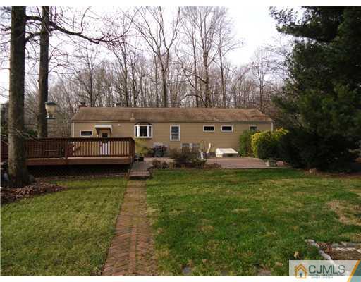 242 New Road Monmouth Junction, NJ 08852 - Photo 10 of 11 a view of a house with backyard and sitting area