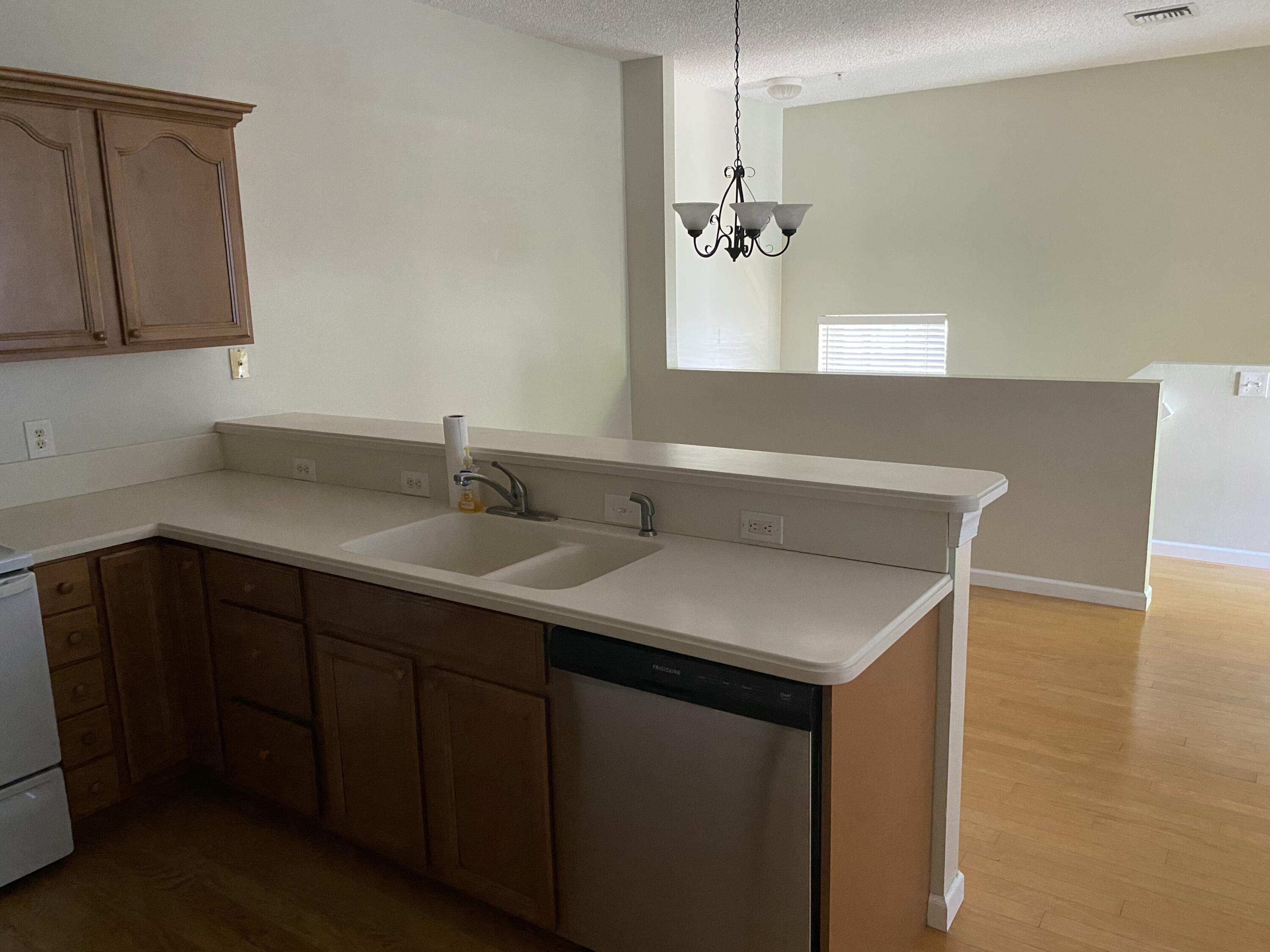 101 Lighthouse Circle, Unit J Tequesta, FL 33469 - Photo 8 of 13 a bathroom with a sink and a mirror