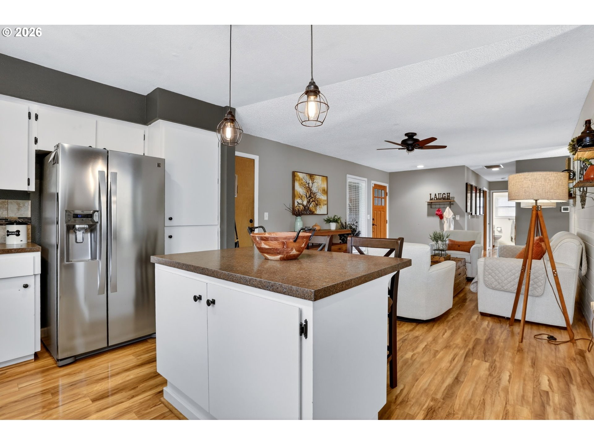 1776 Southeast 114th Place Portland, OR 97216 - Photo 19 of 47 a kitchen with a sink appliances and a wooden floor