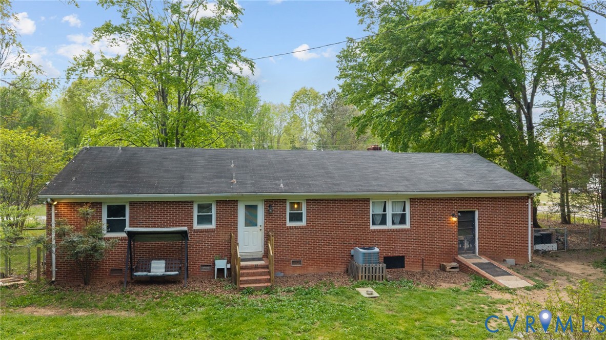 8141 Military Road Amelia Court House, VA 23002 - Photo 29 of 40 a front view of a house with garden
