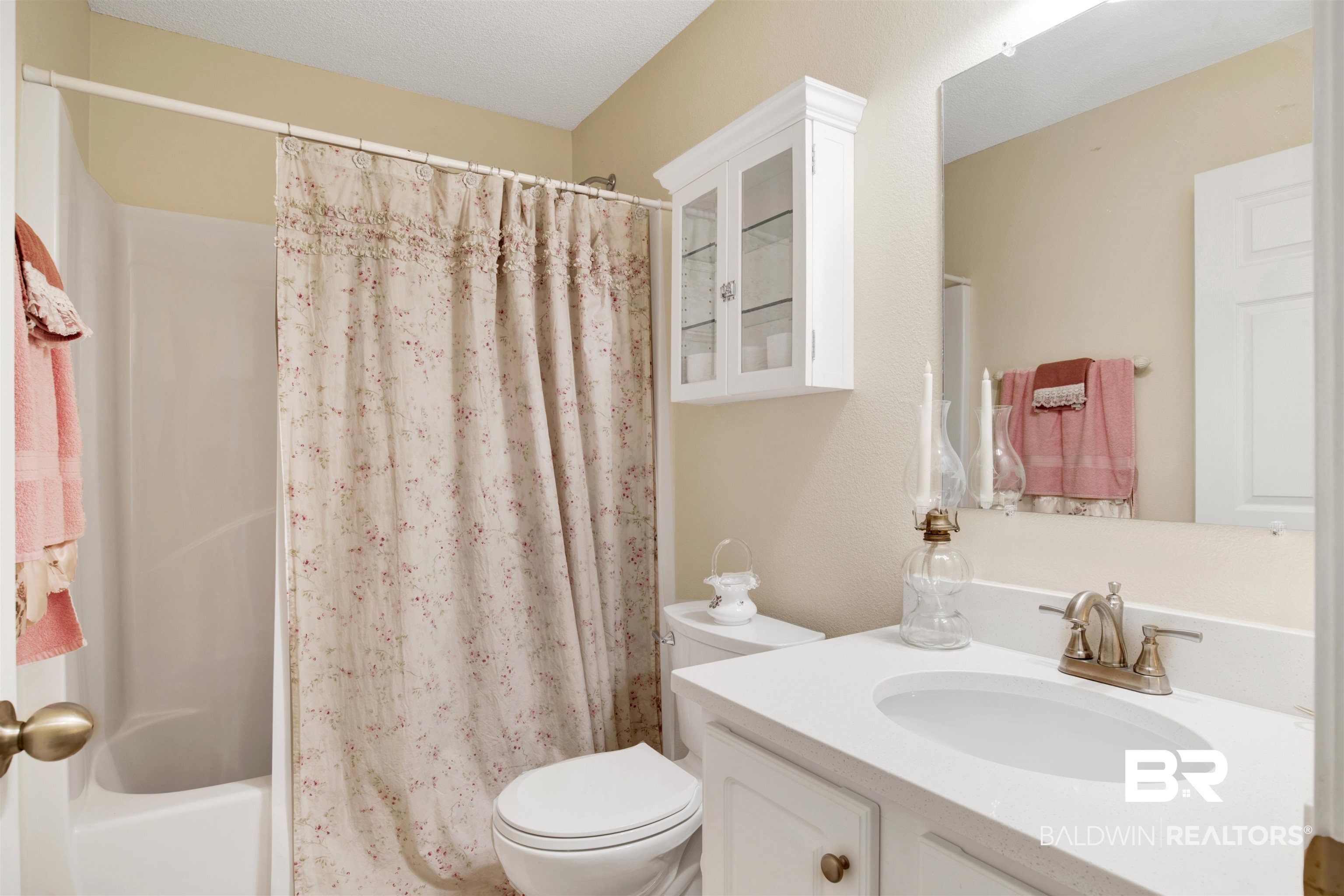 11697 Balsam Court Daphne, AL 36527 - Photo 23 of 31 Full bathroom featuring vanity, shower / bath combination with curtain, and toilet