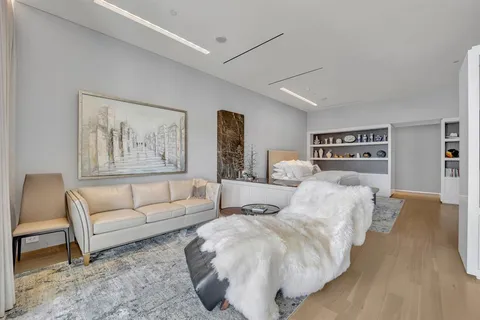 a bed room with two twin beds and a couch