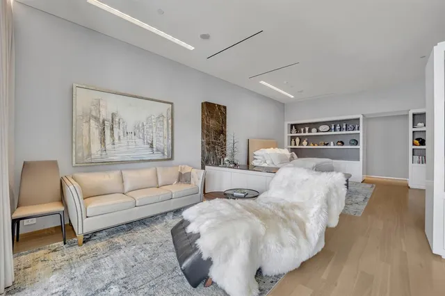 a bed room with two twin beds and a couch