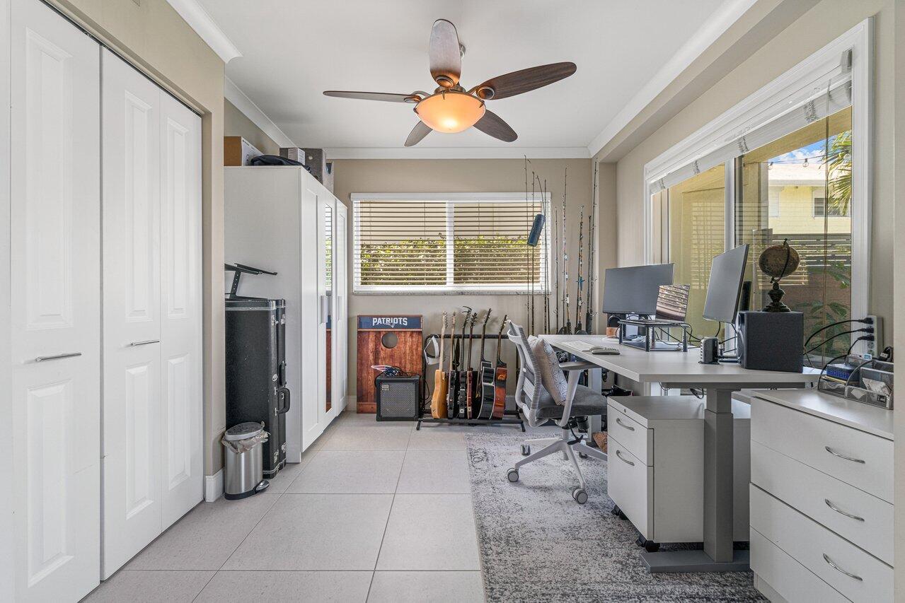 2311 Northeast 36th Street, Unit 1A Lighthouse Point, FL 33064 - Photo 16 of 29 a view of kitchen with furniture stove and refrigerator