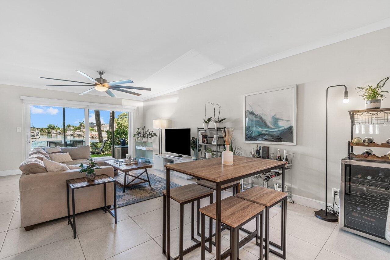 2311 Northeast 36th Street, Unit 1A Lighthouse Point, FL 33064 - Photo 6 of 29 a view of a dining room with furniture