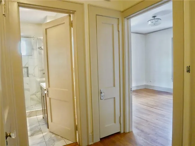 a view of a bathroom with a glass door