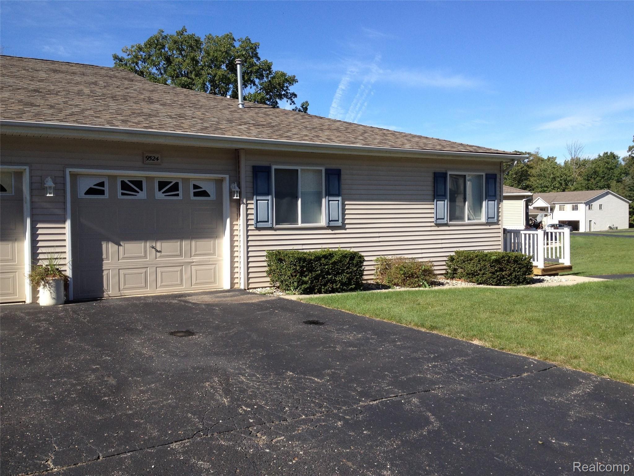 9524 Timber Ridge Drive Grand Blanc, MI 48439 - Photo 3 of 17 2 Car Garage (Stacked)