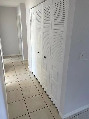 a bathroom with a shower and vanity