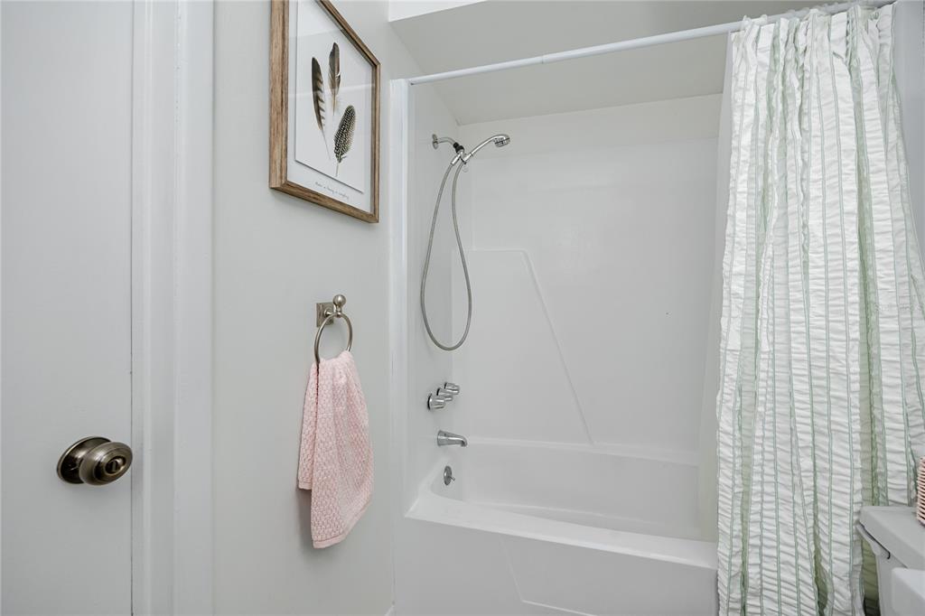 2207 Belleair Road, Unit B30 Clearwater, FL 33764 - Photo 20 of 39 a bathroom with a bath tub