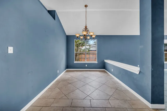 a view of a room with windows