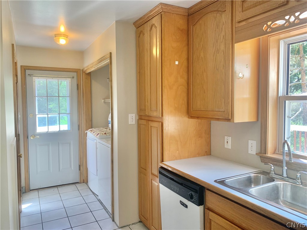 10149 Bailey Lake Road Brookfield, NY 13480 - Photo 21 of 49 Hallway with laundry and direct access to deck on