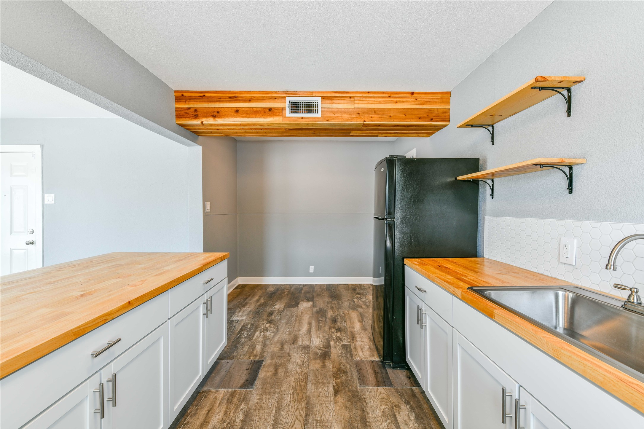 4615 Schroeder Street, Unit 1 Houston, TX 77011 - Photo 13 of 28 a view of storage and utility room