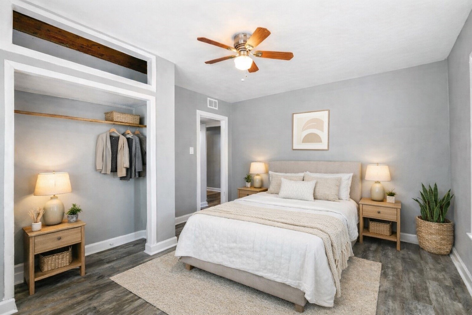 4615 Schroeder Street, Unit 1 Houston, TX 77011 - Photo 19 of 28 a bedroom with a bed and a ceiling fan