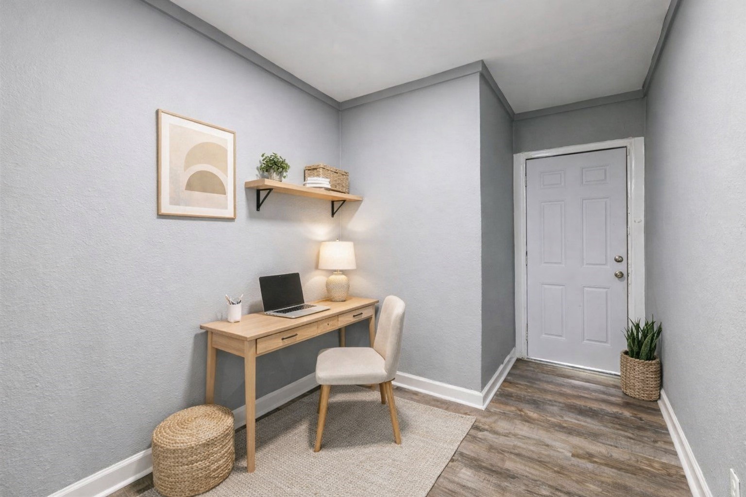 4615 Schroeder Street, Unit 1 Houston, TX 77011 - Photo 25 of 28 a view of a workspace with furniture and wooden floor