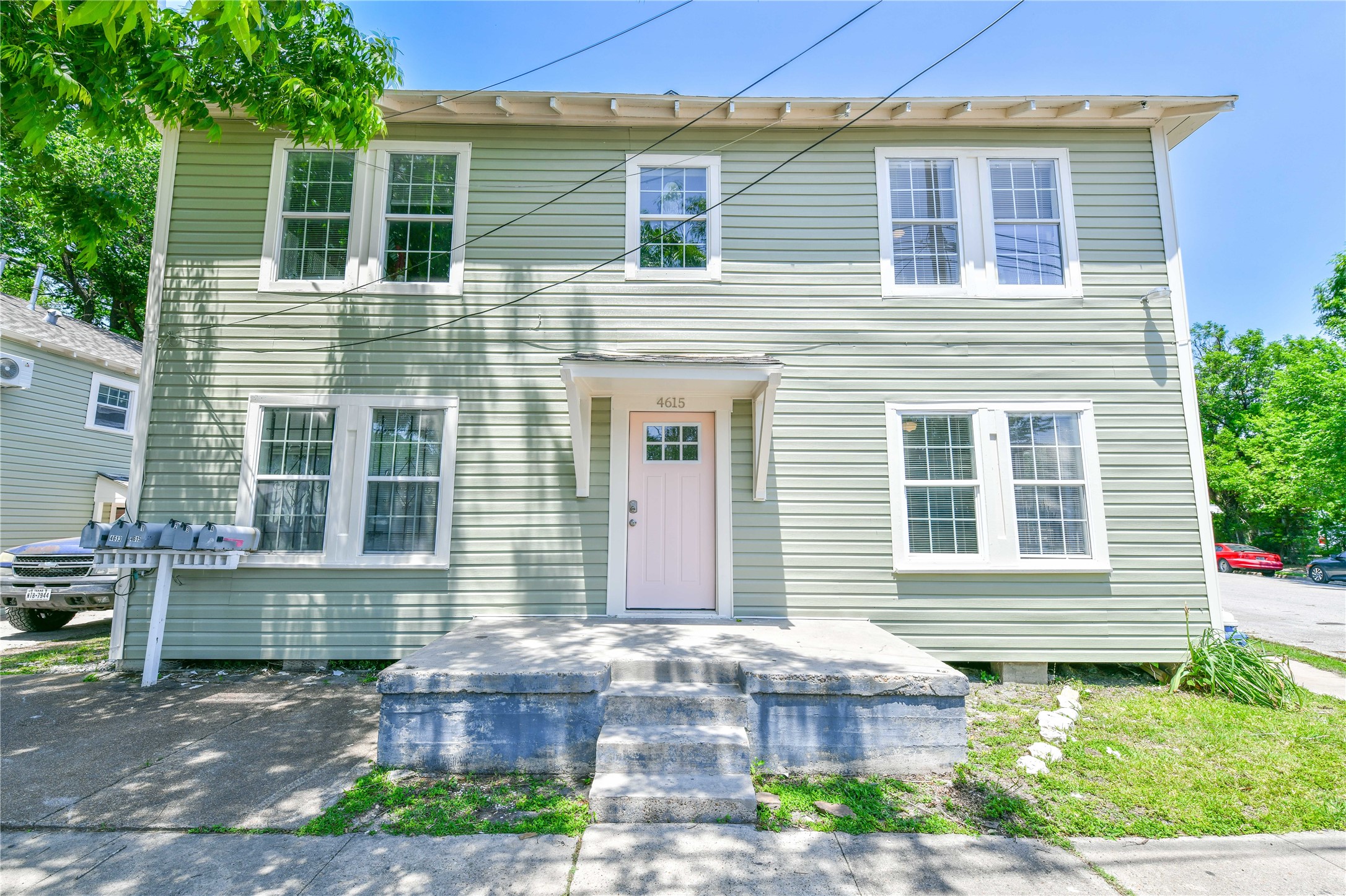 4615 Schroeder Street, Unit 1 Houston, TX 77011 - Photo 6 of 28 a front view of a house with a yard