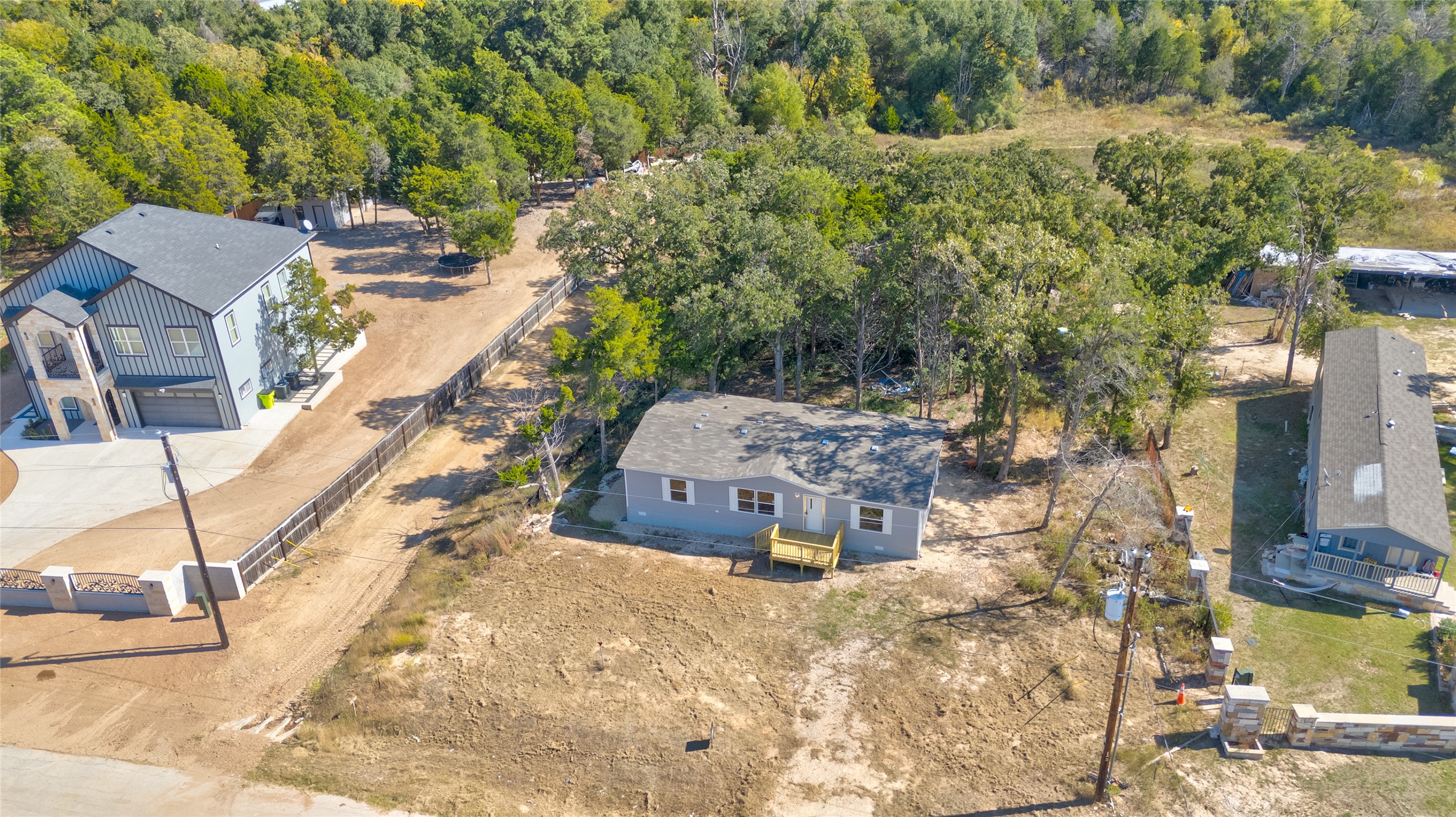 107 Los Cueva Road Elgin, TX 78621 - Photo 4 of 31 a view of a house with a yard