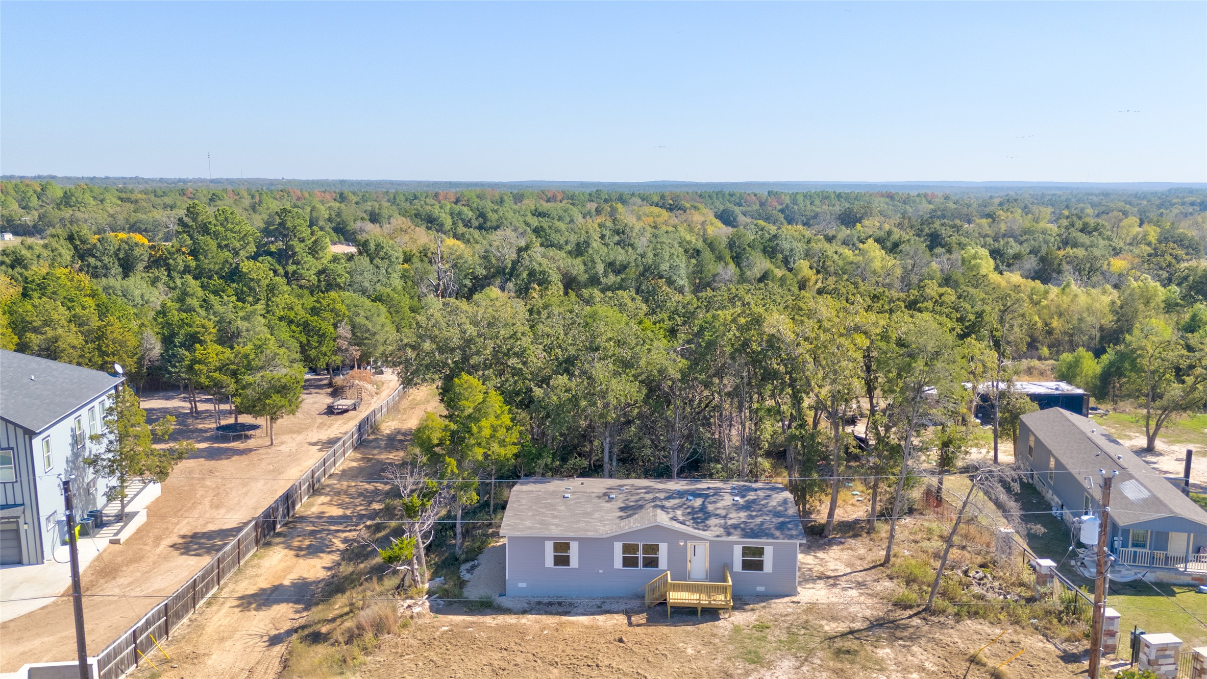 107 Los Cueva Road Elgin, TX 78621 - Photo 7 of 31 an aerial view of a house with a yard
