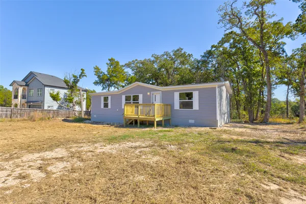 a house view with a outdoor space