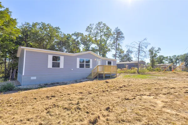 a view of a house with a snow