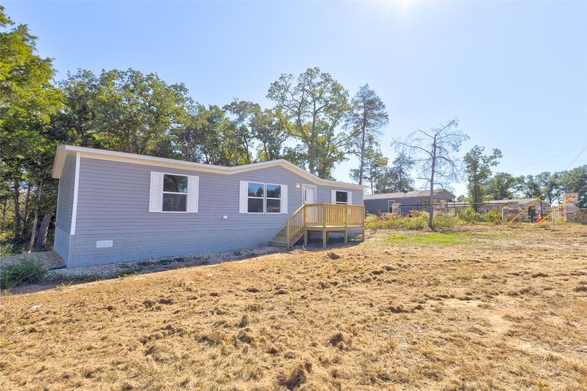 107 Los Cueva Road Elgin, TX 78621 - Photo 10 of 31 a view of a yard with a house