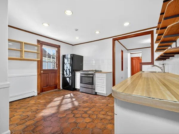 a bed room with a bed and furniture