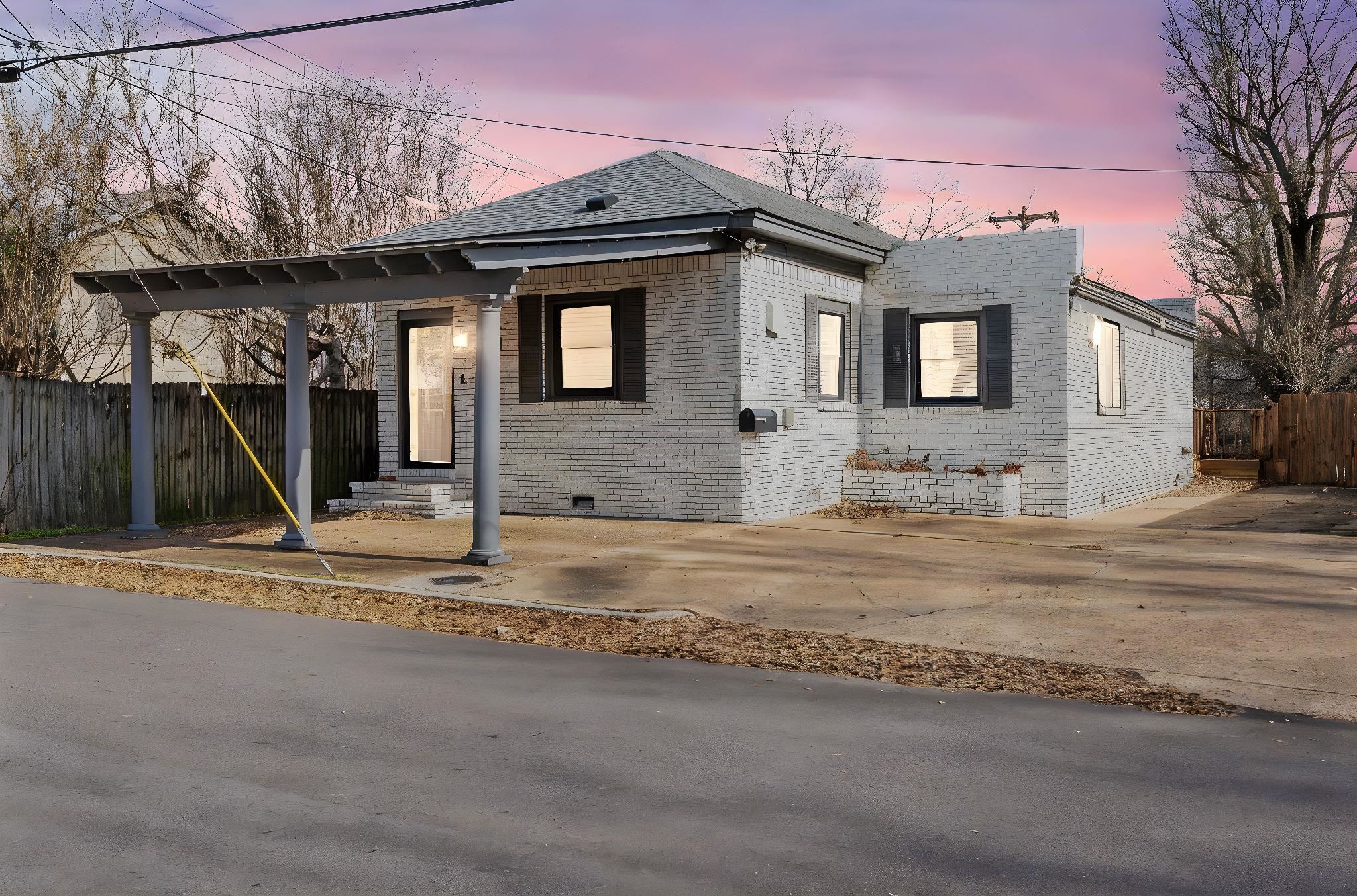 710 Philadelphia Street Memphis, TN 38104 - Photo 2 of 25 a front view of a house with a yard
