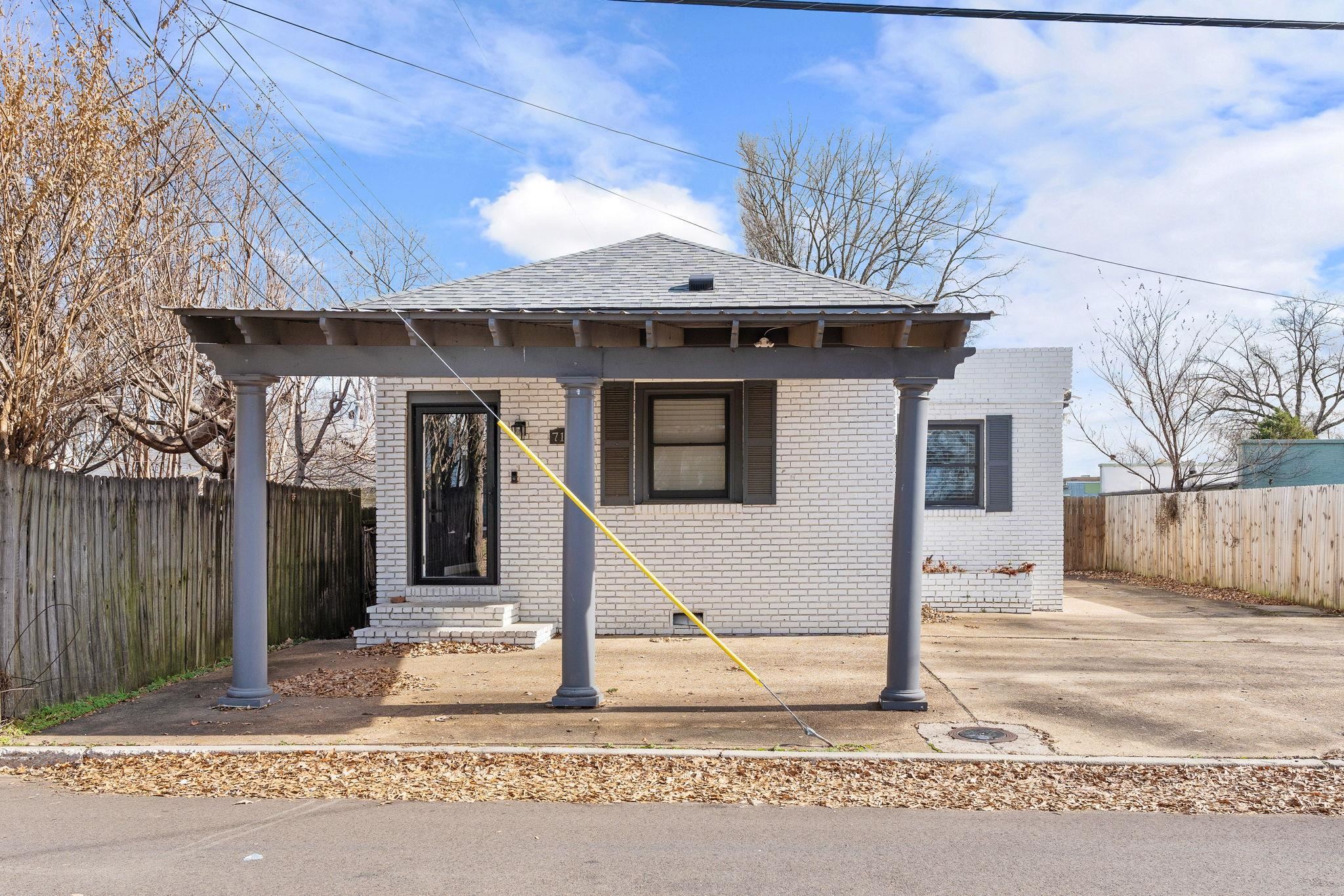 710 Philadelphia Street Memphis, TN 38104 - Photo 21 of 25 a front view of a house with a yard