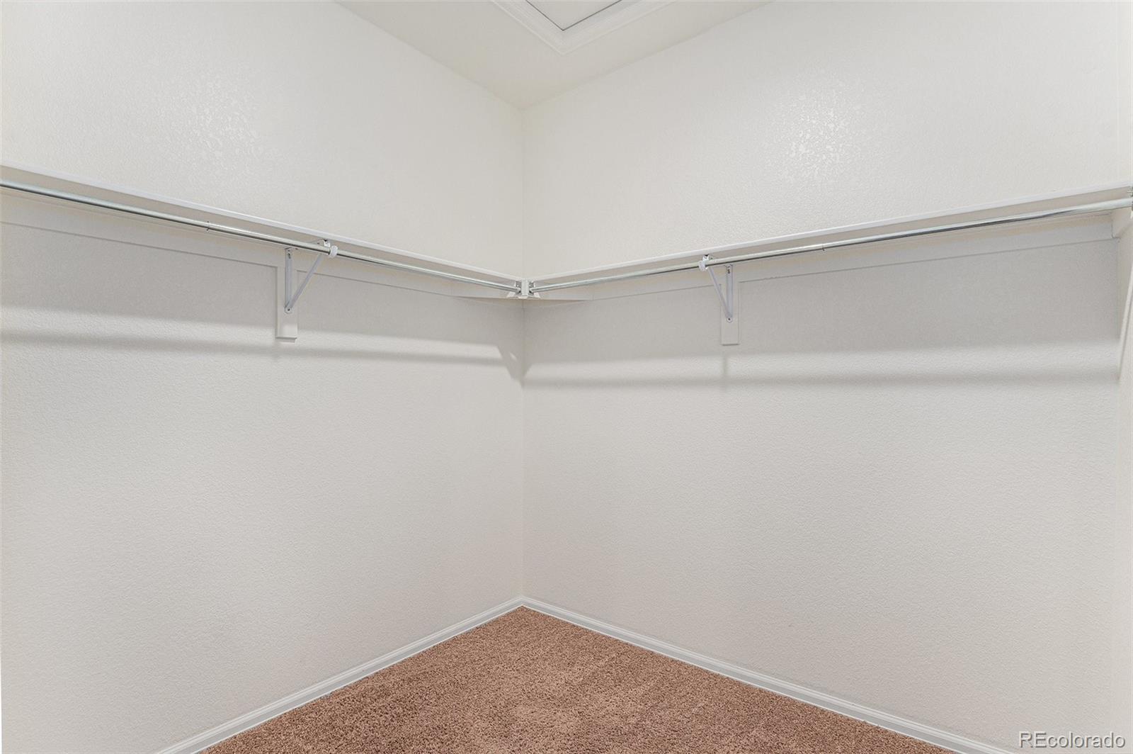 1051 Draw Street Brighton, CO 80603 - Photo 14 of 19 a view of a room with racks on the wall