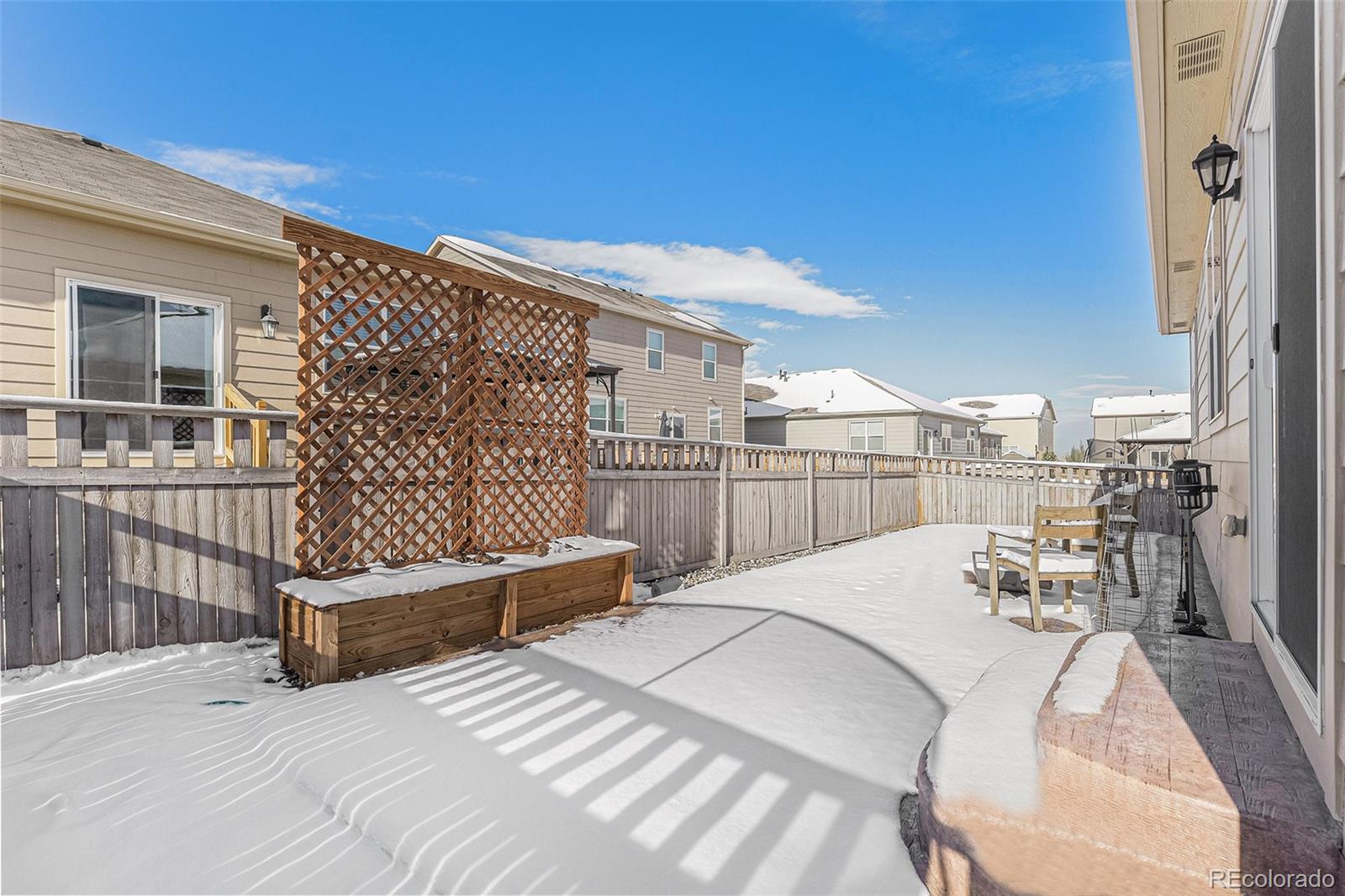 1051 Draw Street Brighton, CO 80603 - Photo 18 of 19 a view of balcony with wooden floor and seating space