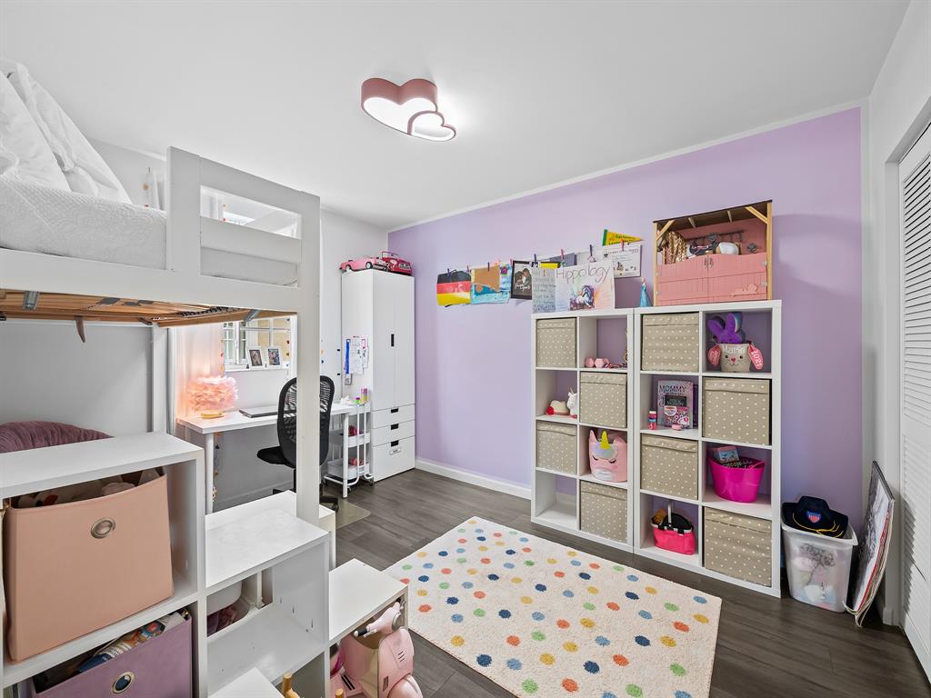 301 Cameron Drive Weston, FL 33326 - Photo 26 of 39 a bedroom with a workspace and a window