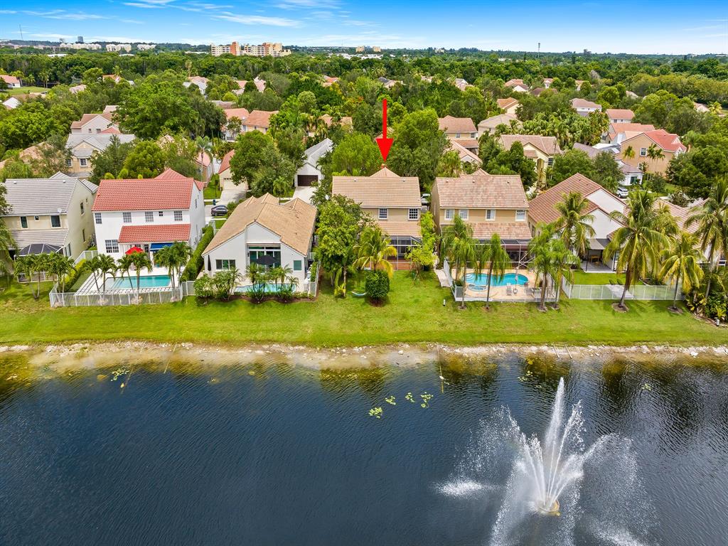 301 Cameron Drive Weston, FL 33326 - Photo 4 of 39 a view of building with ocean view
